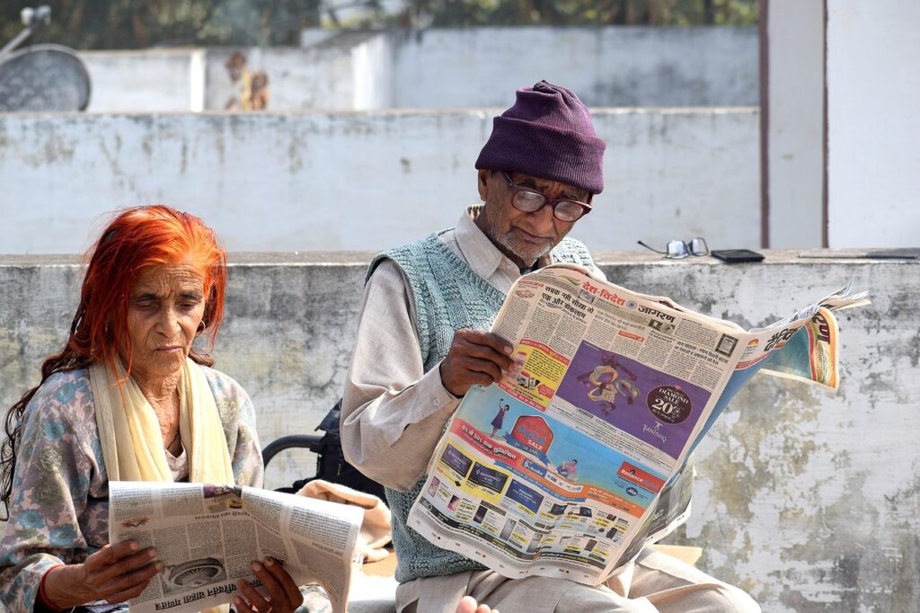 old couple, reading, newspaper-5051770.jpg